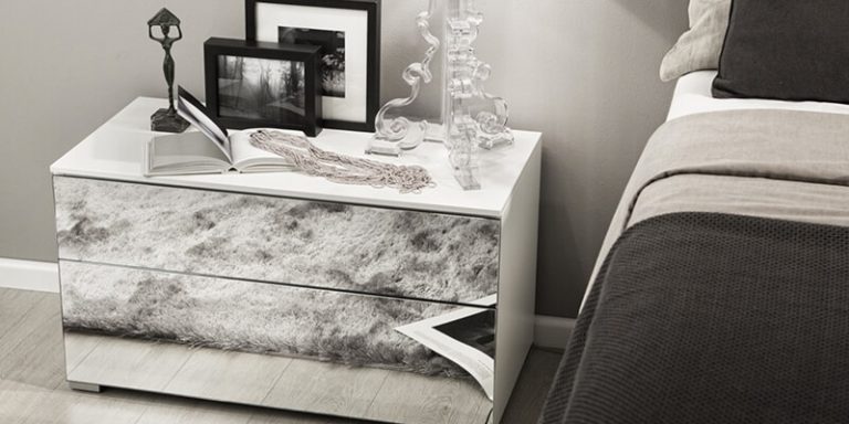 Small bedroom with mirrored draws