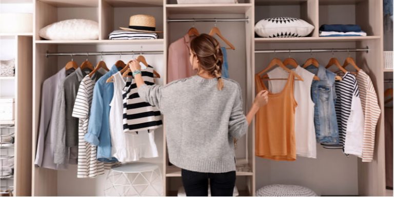 lady organising a wardrobe