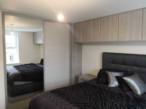 bedroom with sliding wardrobes