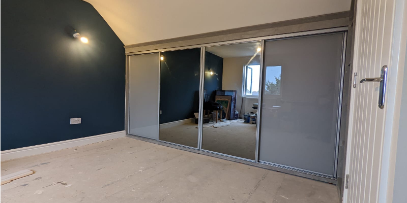 Sloped Ceiling Fitted Wardrobe With Mirror