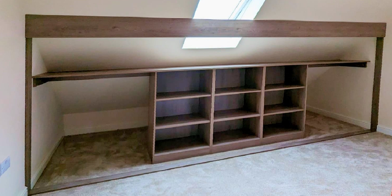 Sloped ceiling built clearance in wardrobe