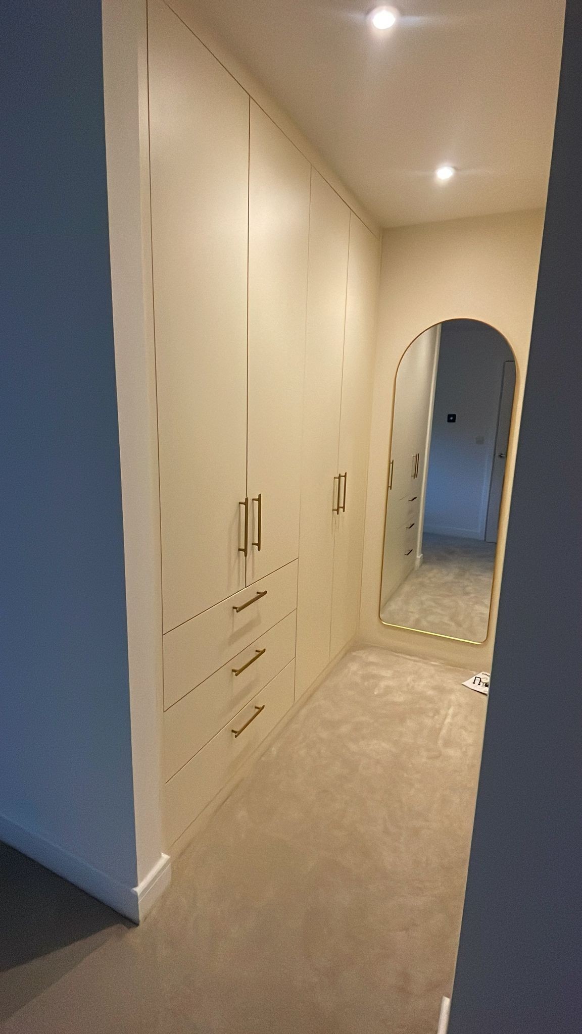 Floor to ceiling wardrobes